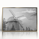 Framed acrylic wall art depicting a scenic landscape with windmills, featuring vibrant colors and gold accents, perfect for home decor.