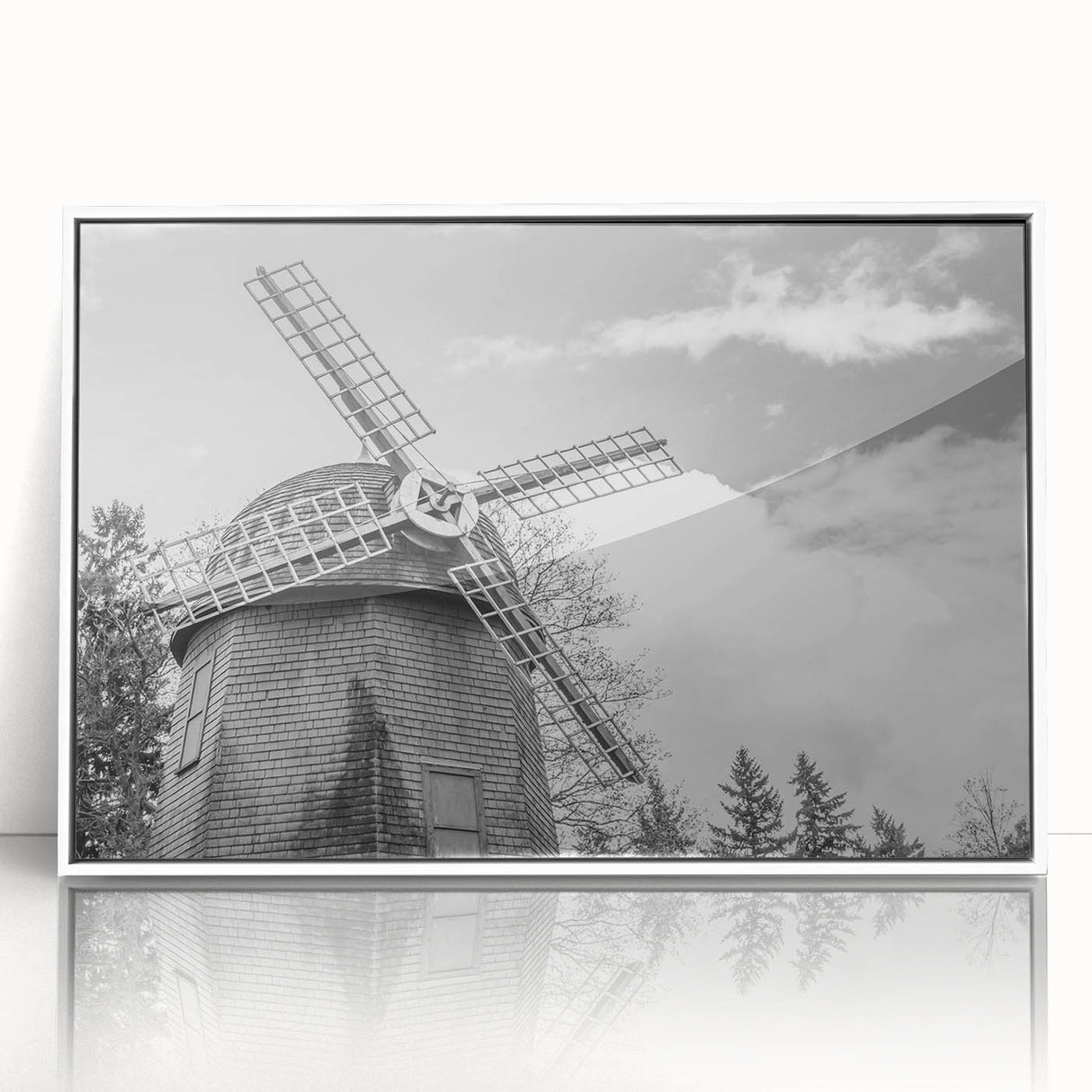 Framed wall art showcasing a vibrant landscape with windmills, featuring a white border and acrylic glass front, ideal for home decor and modern aesthetics.