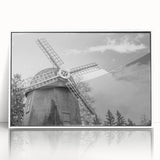 Framed wall art showcasing a vibrant landscape with windmills, featuring a white border and acrylic glass front, ideal for home decor and modern aesthetics.