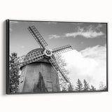 Framed canvas wall art showcasing a picturesque landscape with windmills, featuring a black frame and side view, perfect for home decor and interior styling.