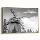 Framed canvas wall art showcasing a vibrant landscape with windmills, featuring gold accents and a sleek side view, perfect for modern home decor.
