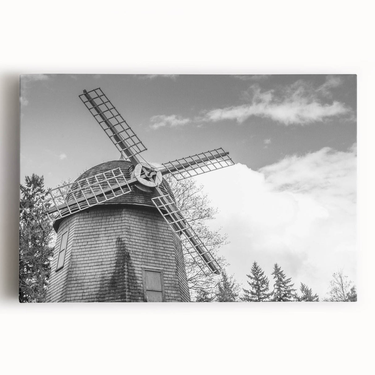 Stretched canvas wall art featuring a vibrant windmill landscape design, showcasing lush green fields and a clear blue sky, ideal for home decor.