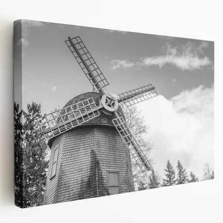 Stretched canvas wall art featuring a serene landscape with windmills, showcasing vibrant colors and intricate details, perfect for home decor and aesthetic enhancement.