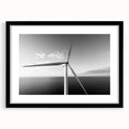 Framed wall art collection showcasing a scenic landscape with windmills, featuring a sleek black frame and white mat for an elegant presentation. Ideal for home decor enthusiasts.
