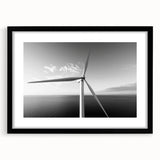 Framed wall art collection showcasing a scenic landscape with windmills, featuring a sleek black frame and white mat for an elegant presentation. Ideal for home decor enthusiasts.