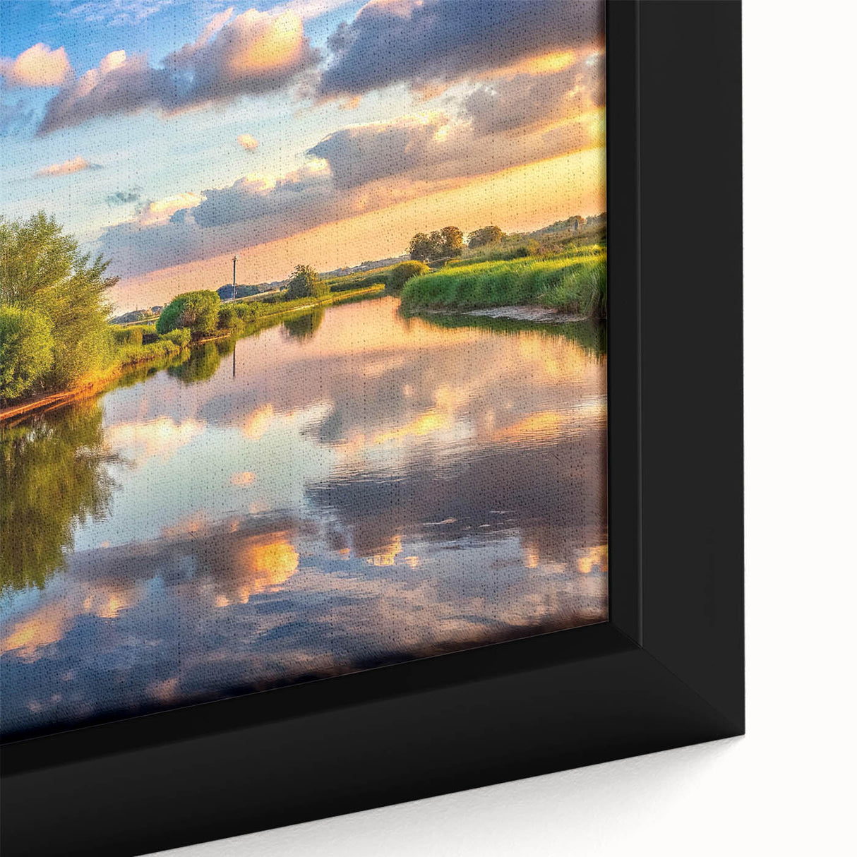 Close-up of a framed canvas depicting a serene landscape with windmills, showcasing vibrant colors and intricate details, perfect for home decor.