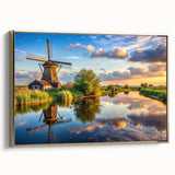 Framed canvas wall art depicting a serene landscape with windmills against a sunset backdrop, featuring gold accents and a stylish side view display.