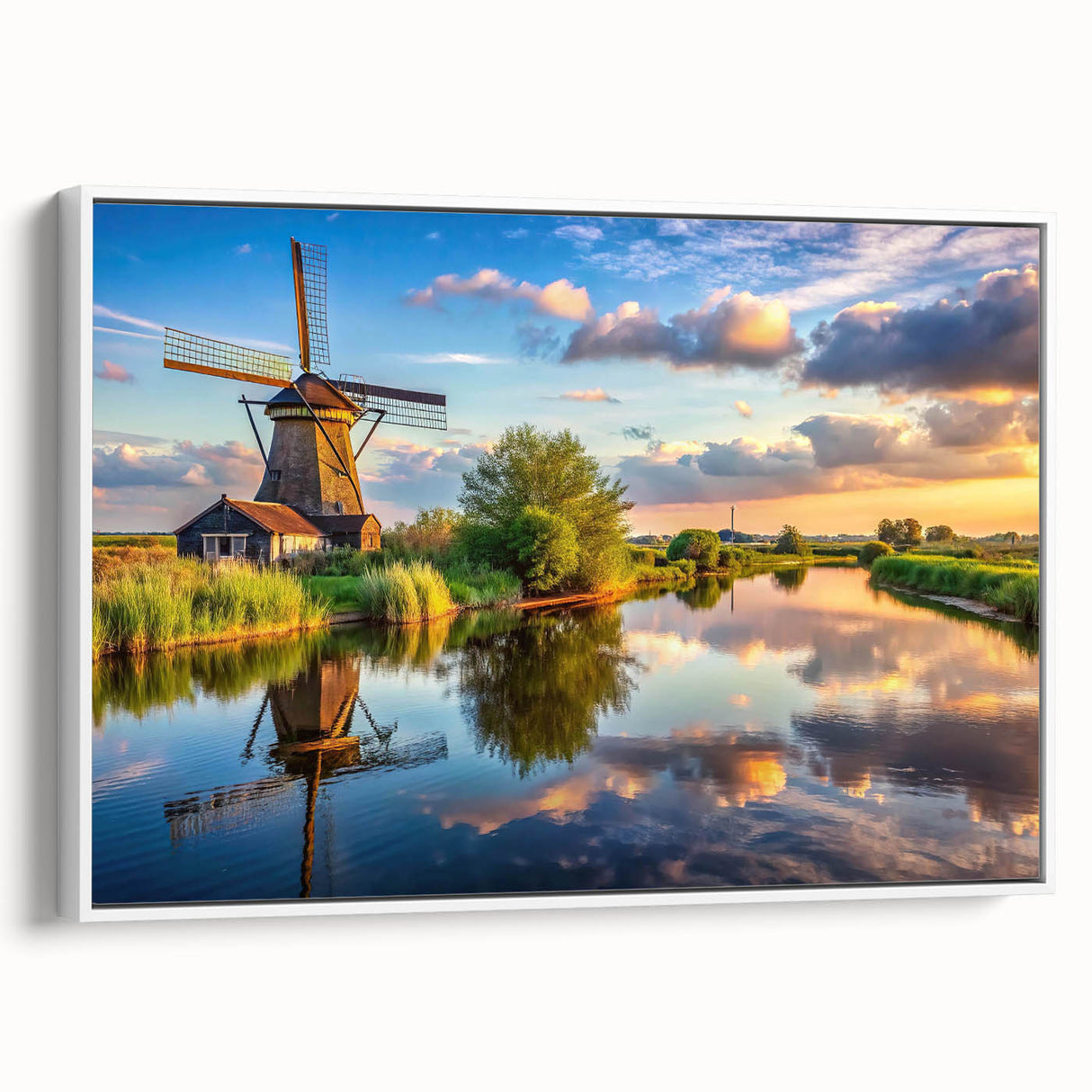 Framed canvas wall art displaying a serene landscape with windmills, showcasing a white border and vibrant colors, perfect for modern home decor.