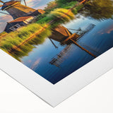 Colorful rolled canvas artwork showcasing a serene landscape with windmills against a vibrant sunset, designed for wall decor enthusiasts, emphasizing tranquility and nature.