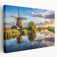 Stretched canvas artwork showcasing a vibrant landscape with windmills, featuring dynamic colors and intricate details, ideal for home decor or office aesthetics.