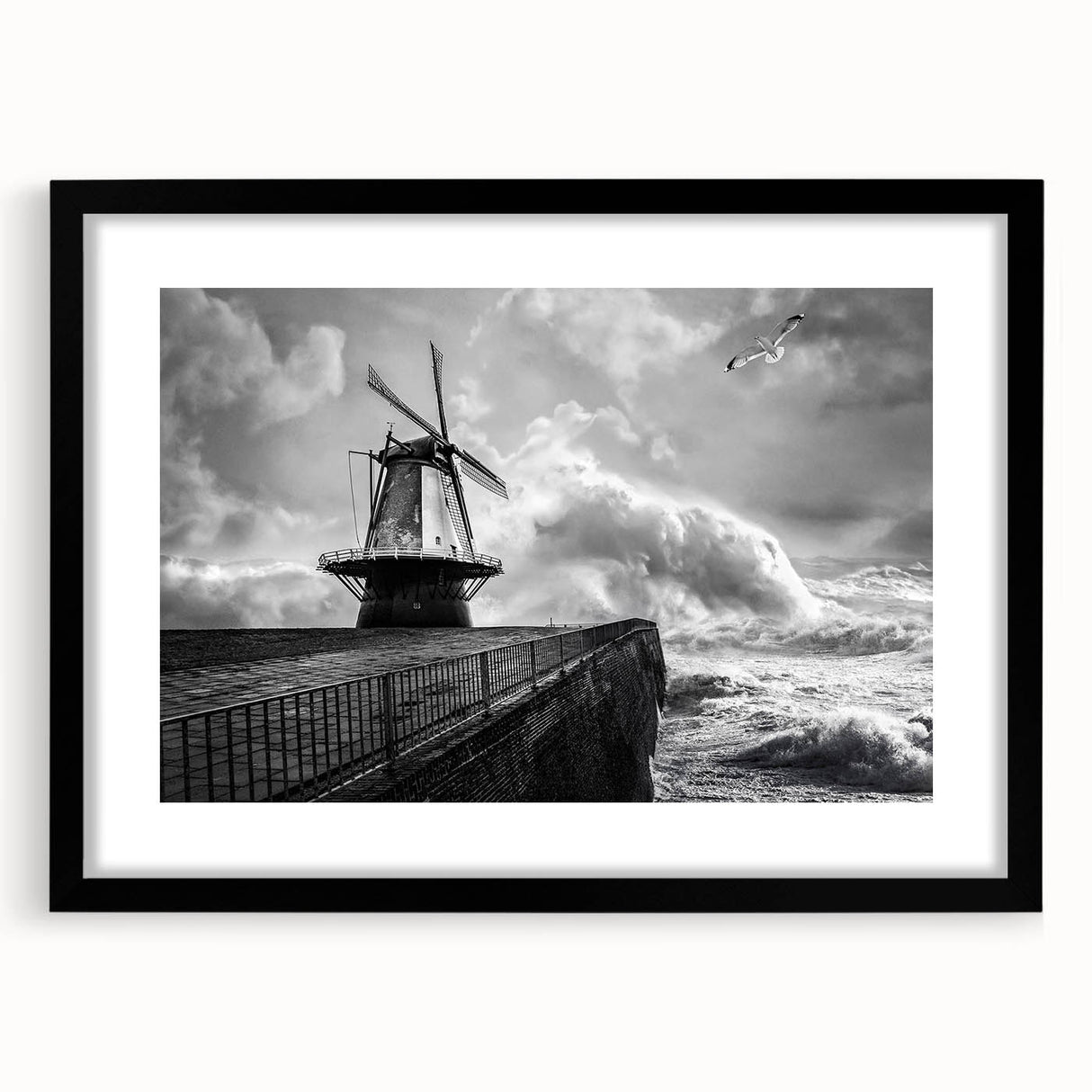 Black-framed wall art showcasing a stunning landscape of windmills against a vibrant sunset, ideal for modern home decor and art enthusiasts. Perfect for adding elegance to living spaces.