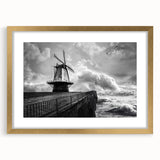 Framed wall art showcasing a serene landscape with windmills, featuring a gold mat and frame, perfect for home decor and enhancing interior aesthetics.
