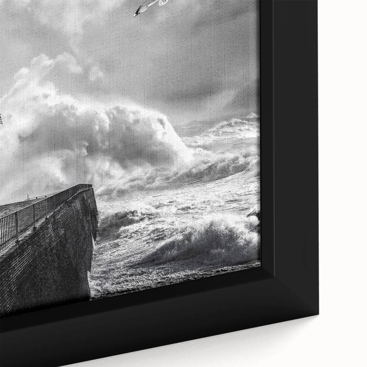 Close-up of a framed canvas wall art piece showcasing a serene landscape with windmills, featuring vibrant colors and intricate details, perfect for home decor.