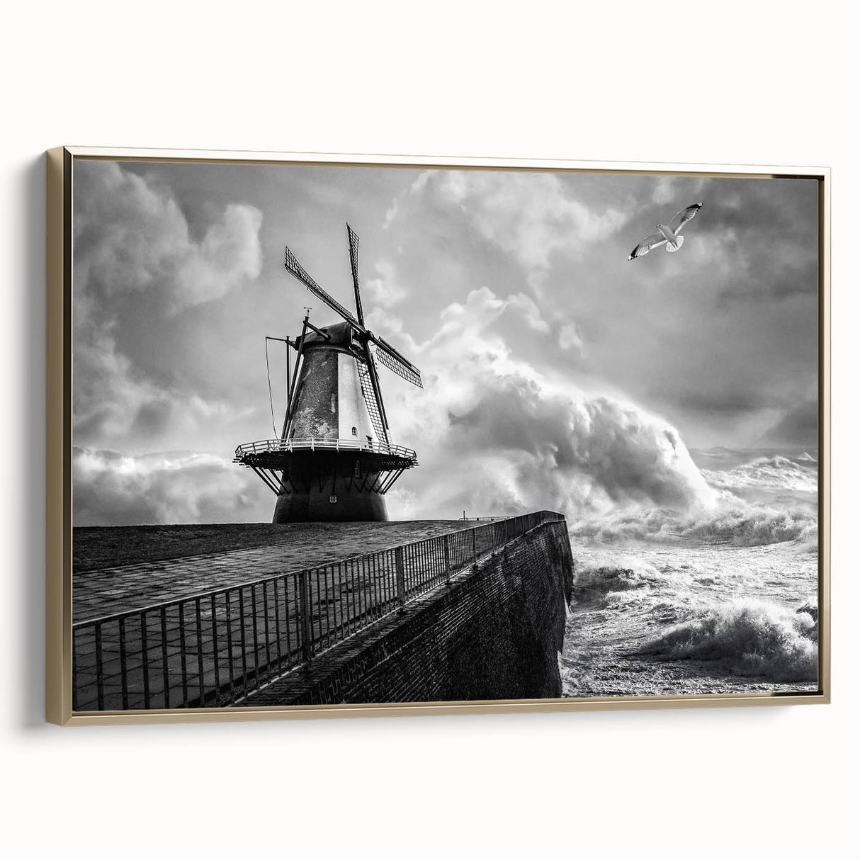 Framed canvas artwork of a serene landscape featuring windmills, with a gold frame highlighting the scene, ideal for home decor in modern settings.