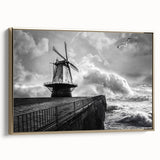 Framed canvas artwork of a serene landscape featuring windmills, with a gold frame highlighting the scene, ideal for home decor in modern settings.