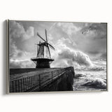 Framed canvas wall art depicting a serene landscape with windmills, featuring a silver frame, ideal for home decor, enhancing modern and rustic interiors.