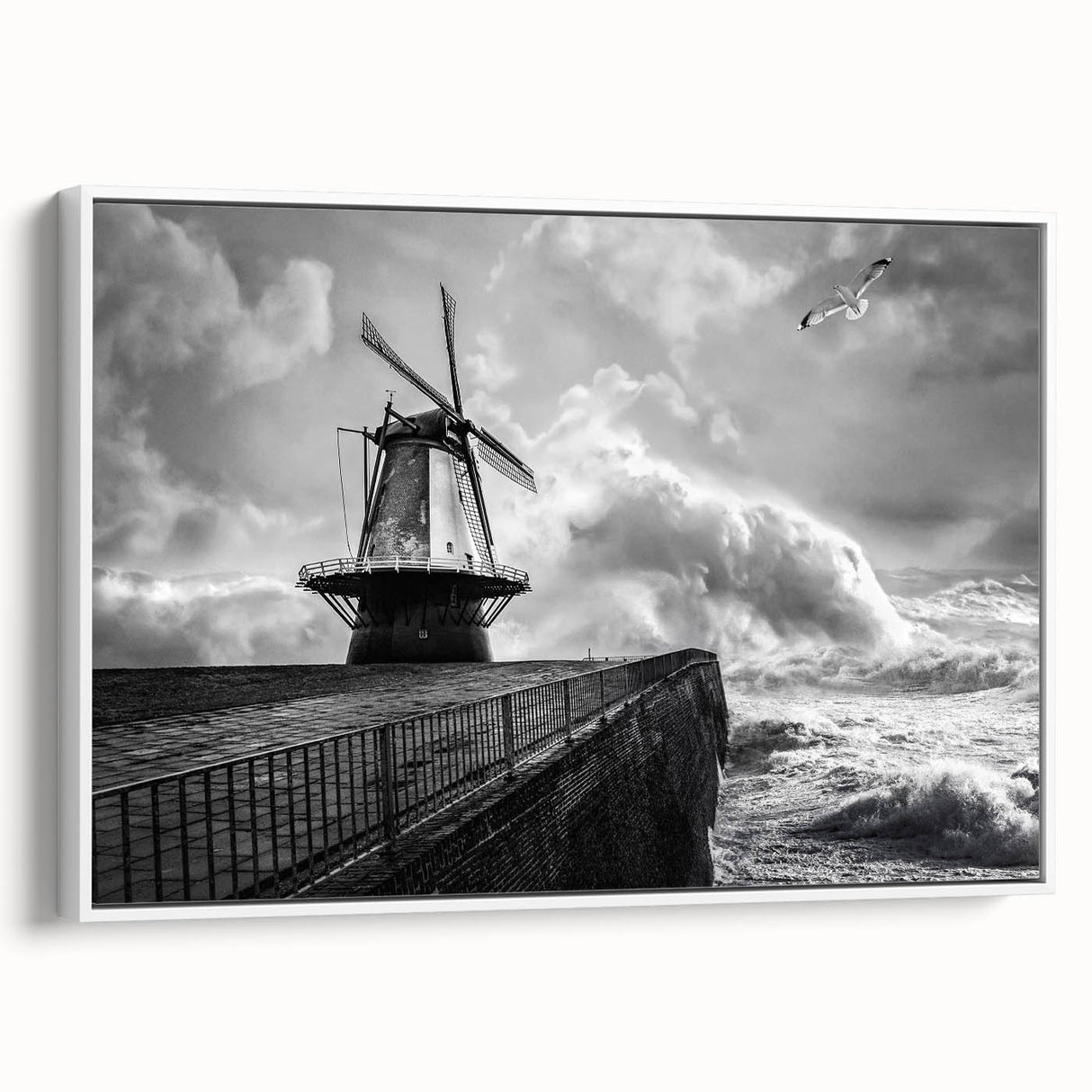Framed canvas wall art showcasing a serene landscape with windmills, featuring a white frame and vibrant colors, ideal for home decor enhancement.