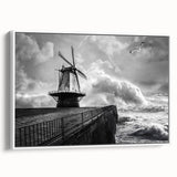 Framed canvas wall art showcasing a serene landscape with windmills, featuring a white frame and vibrant colors, ideal for home decor enhancement.