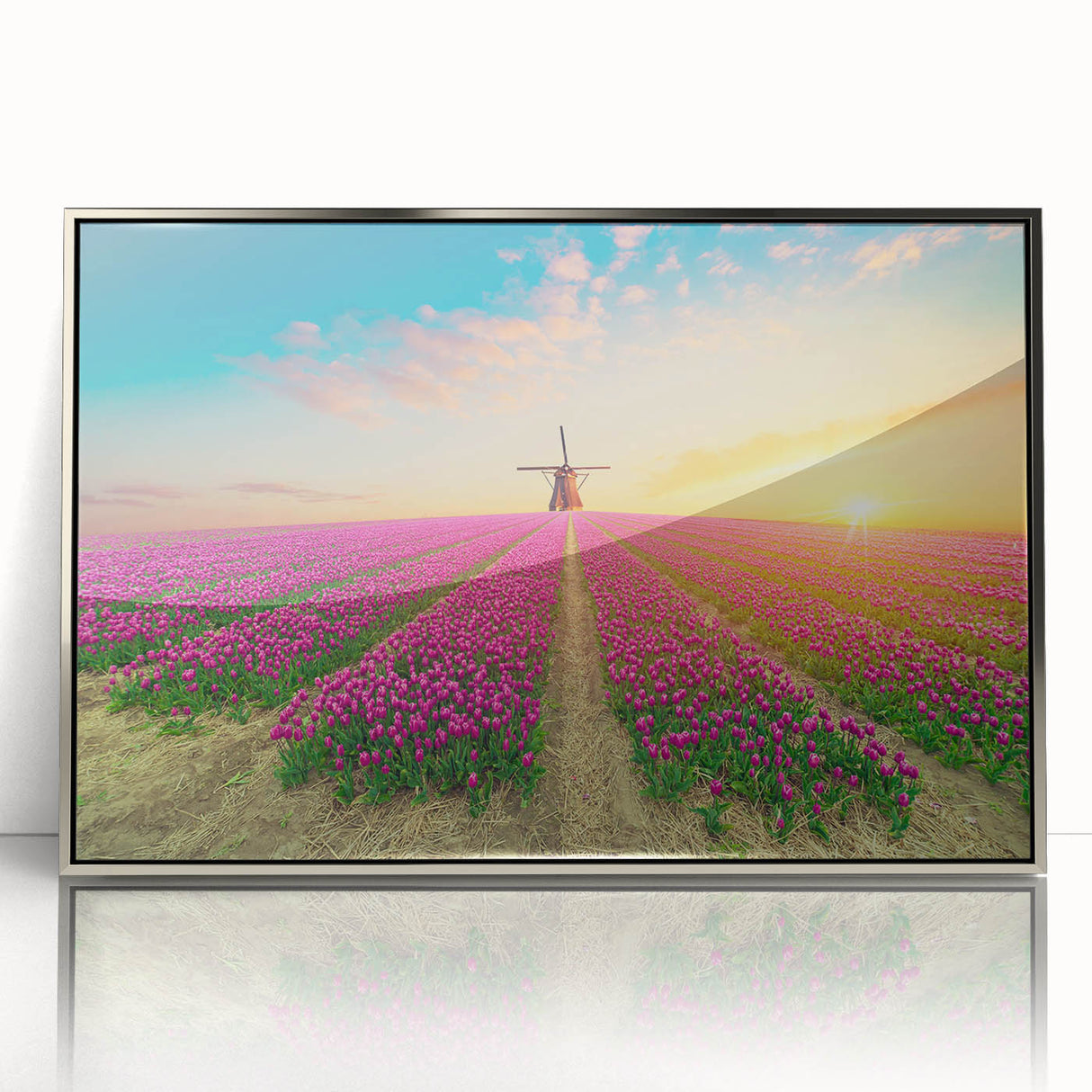 Framed wall art collection showcasing a scenic landscape with windmills, presented in a sleek silver frame, ideal for modern home decor and interior design.