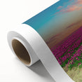 Rolled canvas wall art featuring a vibrant landscape scene with windmills set against a colorful sunset, showcasing intricate details and rich hues, perfect for home decor.