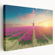 Stretched canvas wall art featuring a vibrant landscape with windmills, showcasing a serene rural setting at sunset, ideal for home decor enthusiasts.