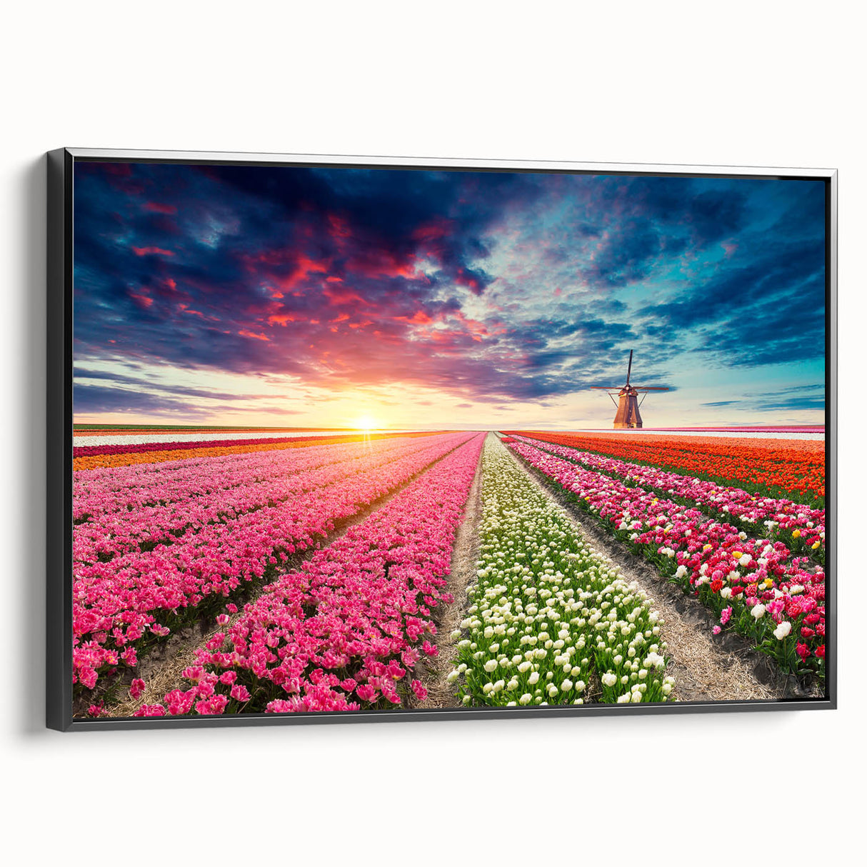 Framed canvas wall art showcasing a stunning landscape with windmills, featuring a black frame and vibrant colors, perfect for enhancing modern home decor.