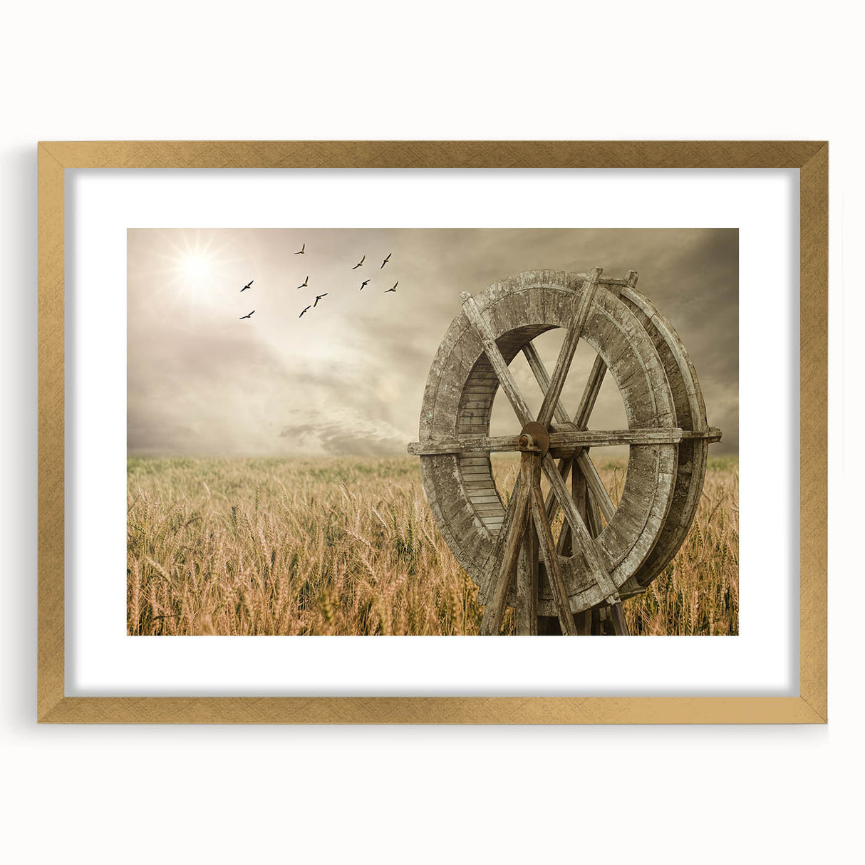 Framed wall art showcasing a scenic landscape with windmills, featuring a gold mat and elegant frame, perfect for enhancing home decor.