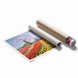 Colorful rolled print showcasing a serene landscape with windmills against a vibrant sunset, perfect for home decor or art enthusiasts, packaged securely in a tube.