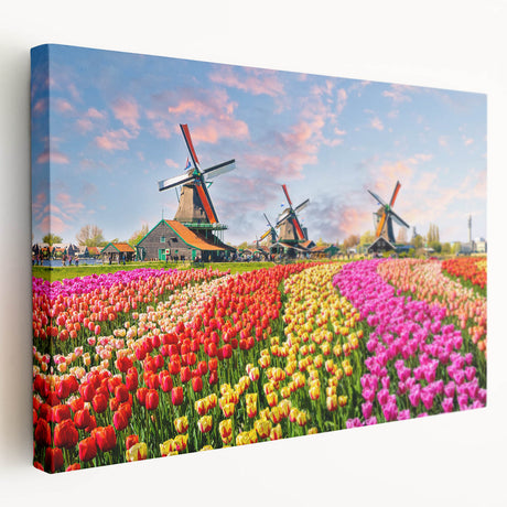Stretched canvas wall art featuring a serene landscape with windmills against a clear blue sky, perfect for home decor. Ideal for nature lovers seeking tranquility.
