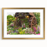 Gold-framed wall art featuring a serene landscape with windmills, showcasing vibrant colors and intricate details, perfect for home decor and enhancing interiors.