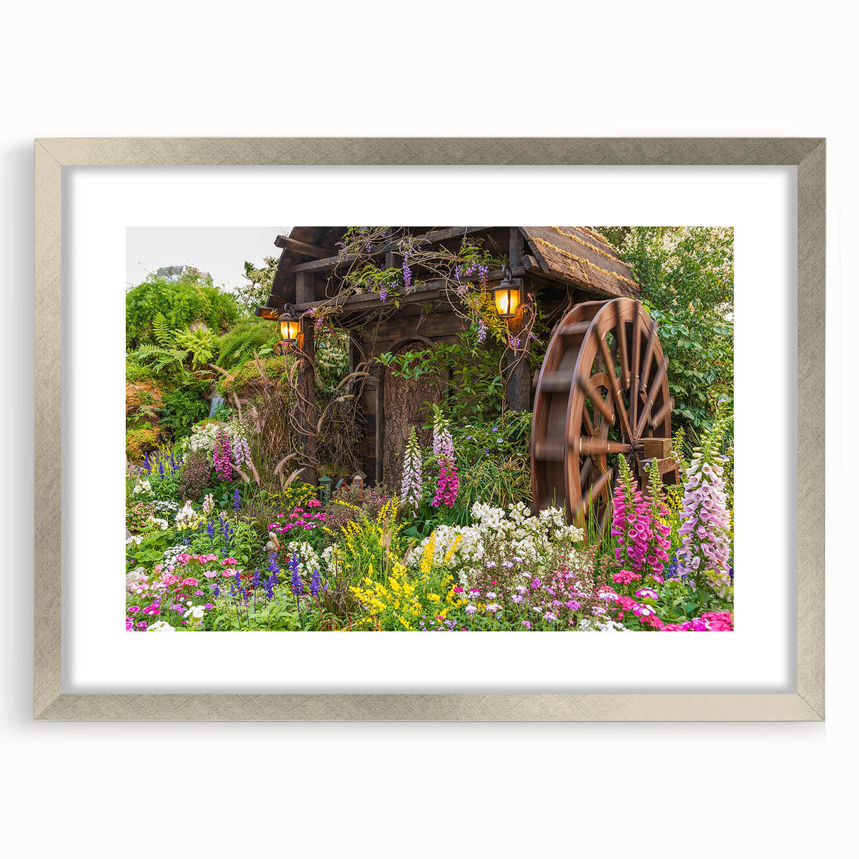 Framed wall art collection showcasing a serene landscape with windmills, featuring a silver mat and frame, ideal for enhancing home decor with a touch of elegance.