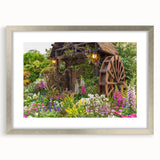 Framed wall art collection showcasing a serene landscape with windmills, featuring a silver mat and frame, ideal for enhancing home decor with a touch of elegance.
