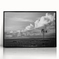 Framed wall art featuring a scenic landscape with windmills, designed in a modern acrylic style. The black frame enhances the vibrant colors, ideal for contemporary home decor.