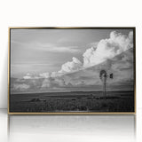 Framed wall art featuring a scenic landscape of windmills, highlighted by a gold-accented frame, ideal for modern home decor. The acrylic surface enhances color vibrancy.