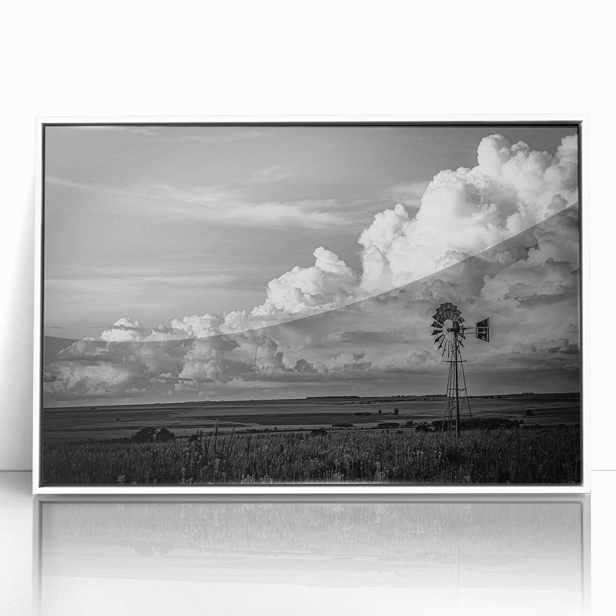 Framed acrylic wall art featuring a serene landscape with windmills, showcasing soft pastel colors and intricate details, ideal for home decor and artistic ambiance.