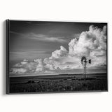 Framed canvas wall art featuring a serene landscape with windmills, showcasing vibrant colors and intricate details, perfect for enhancing home decor.