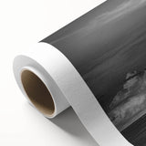 Rolled canvas wall art featuring a serene landscape with windmills set against a vibrant sunset sky, showcasing warm orange, pink, and purple hues. Perfect for home decor.