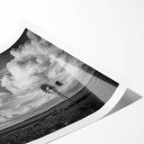 Colorful landscape wall art featuring windmills against a serene sunset backdrop, rolled and ready for display, perfect for home decor enthusiasts seeking vibrant designs.