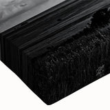 Close-up of a stretched canvas wall art piece showcasing a serene landscape with windmills, featuring vibrant colors and intricate details, ideal for home decor.