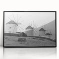 Framed wall art collection showcasing a serene landscape with windmills, featuring a sleek black frame and acrylic front for a modern touch in home decor.