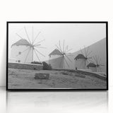 Framed wall art collection showcasing a serene landscape with windmills, featuring a sleek black frame and acrylic front for a modern touch in home decor.