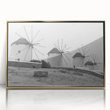 Framed wall art collection featuring a vibrant landscape with windmills, set in an elegant gold frame. Perfect for enhancing modern home decor.