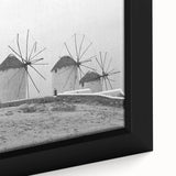 Close-up of a framed canvas wall art piece showcasing a vibrant landscape featuring windmills, with intricate details and rich colors that enhance any decor. Perfect for adding a touch of nature-inspired elegance to your living space.