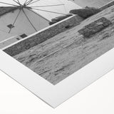 Rolled canvas artwork showcasing a vibrant landscape with windmills against a dramatic sky, perfect for home decor. Ideal for art enthusiasts and collectors.