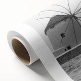 Colorful rolled canvas art depicting a serene landscape with windmills under a vibrant sunset, showcasing intricate details and rich hues, perfect for home decor.