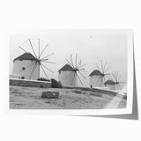 Vibrant landscape wall art print showcasing windmills against a sunset backdrop, rolled and ready for framing, ideal for home decor enthusiasts.