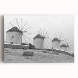 Stretched canvas artwork showcasing a vibrant landscape with windmills under a clear blue sky, perfect for home decor or office aesthetics. Ideal for enhancing modern interiors.