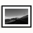 Framed wall art collection showcasing a serene landscape with windmills, featuring a black mat and sleek black frame, perfect for home decor and aesthetic enhancement.