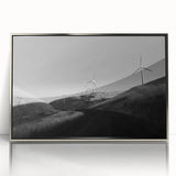 Framed wall art collection featuring a picturesque landscape with windmills, presented in a sleek silver frame, ideal for enhancing home décor with a touch of nature.