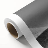 Rolled canvas print showcasing a vibrant landscape design with windmills, featuring soft hues of blue and green, ideal for home decor enhancement.